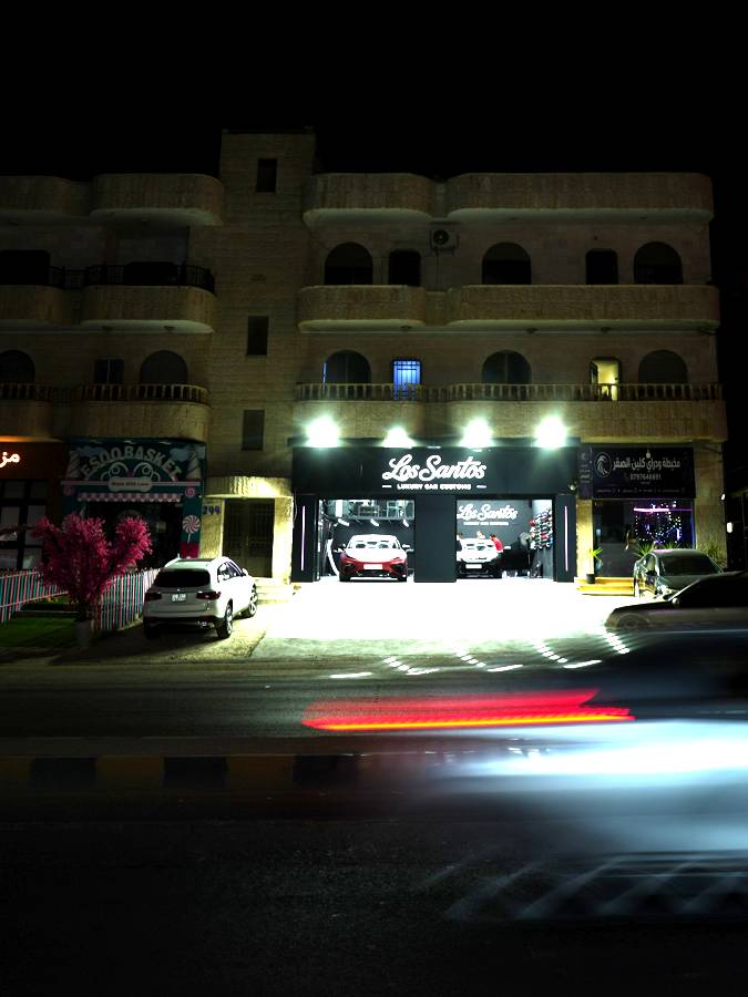 Light trails outside the shop at night